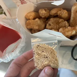 This their sesame chicken...sweet and sour sauce + a bag of sesame seeds