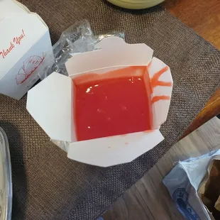 This is the 'red sauce' they sent for my husbands sesame chicken... its sweet and sour sauce
