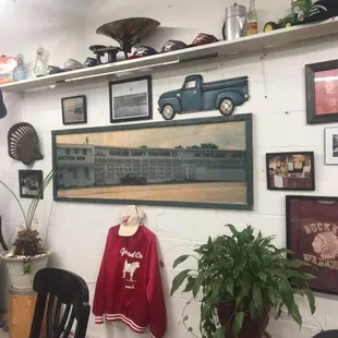 a room with a lot of things on the wall
