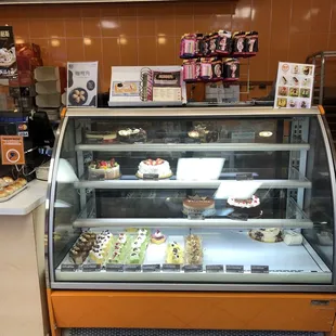 a display of cakes and pastries