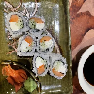 Philly roll with cream cheese and cucumbers.  The wasabi has a harsh kick that makes you want to go back for more....