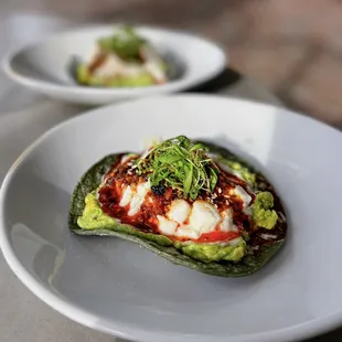 Crudo Tostada w/ fresh fish crudo, crushed avocado, sesame seeds, salsa matcha [sic] | HH Menu - $10 each (Skip!)