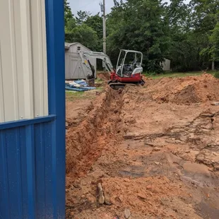 Trenching for conduit