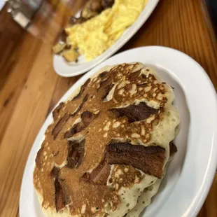 a stack of pancakes and eggs
