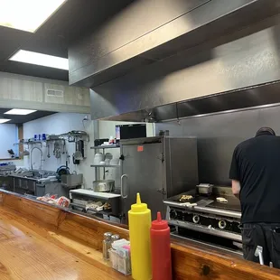 a man preparing food in the kitchen