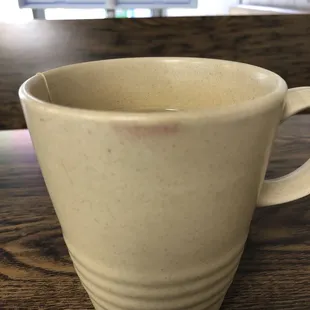 Lipstick on mug.