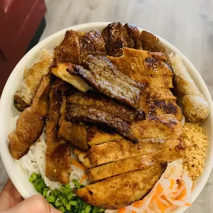 a person holding a bowl of food