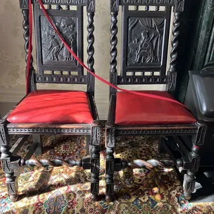 Shakespeare inspired carved chairs. Sherman loved the theater