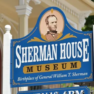 The bright blue and gold sign helps visitors find the museum in downtown Lancaster.