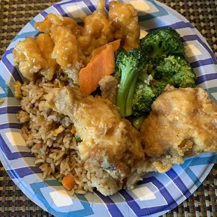 From my takeout box. Fried rice, orange chicken, veggies, and salt &amp; pepper wings!