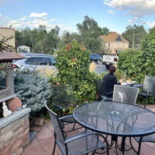 Outside dining and beautiful vine arch