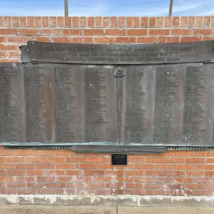 Plaque dedicated to all the sons and daughters who made the supreme sacrifice in WWII