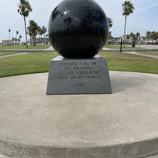 Globe with a plaque dedicated to the men and women who served in a global war on terrorism
