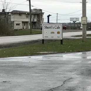 a sign for sherri&apos;s cafe