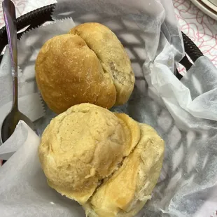 two rolls of bread in a basket