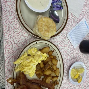 Scrambled eggs, , home fried pita, biscuit with gravy
