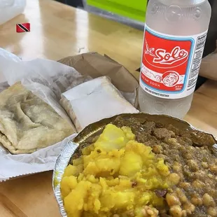 curry goat dinner and doubles