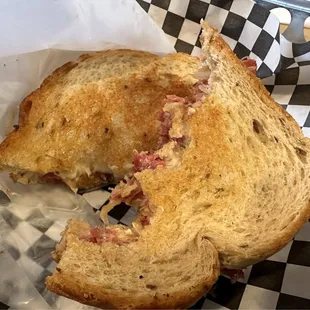 Bitten into Ruben sandwich