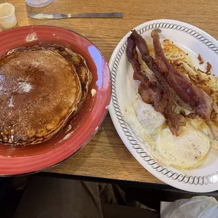 2 eggs over easy, bacon, hash browns, and 2 pancakes!