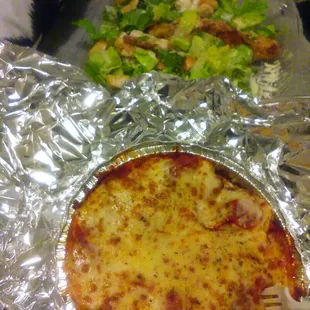 Caesar salad with grilled chicken and Chicken Parmigana