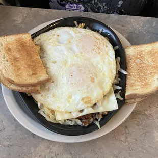 Skillet eggs hash browns cheese