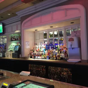 a bar with a television in the background