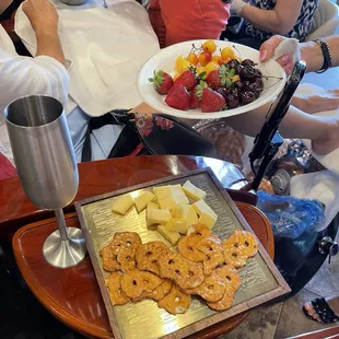 Gouda cheese, champagne, rose, fresh fruits, charcuterie board, pampering, pedicure
