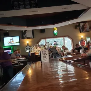 people sitting at the bar