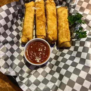 Hand rolled wonton wrapped mozzy sticks. SO GOOD!