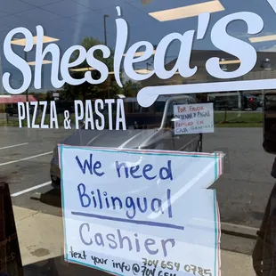 a sign in the window