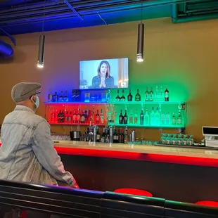 a man sitting at the bar