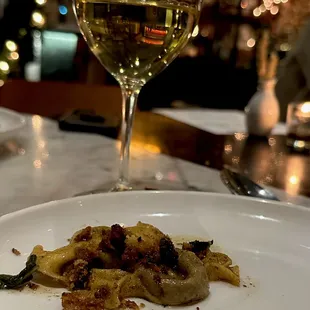 These pretty little pastas were made to look like candy caramels. They had chestnut filling and brown butter &amp; sage sauce and were so good!