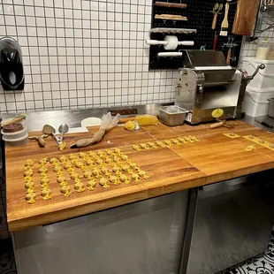 These are the little caramel pastas we loved being made in the pasta room.