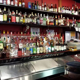 shelves of liquor and liquor bottles
