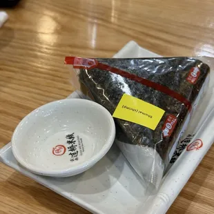 Rice ball, a little pricey at 5.99 for one. Would have looked better if it was sliced and brought out like their menu.
