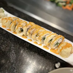 Sushi  roll had jalapeños and cream cheese inside