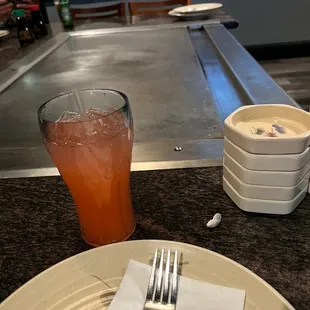 a plate of food and a drink