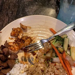 Already started eating in this photo... Steamed veggies, steamed and fried rice, and meats!