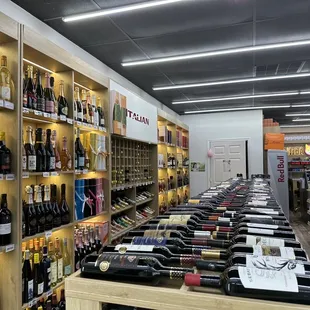 rows of bottles of wine on shelves