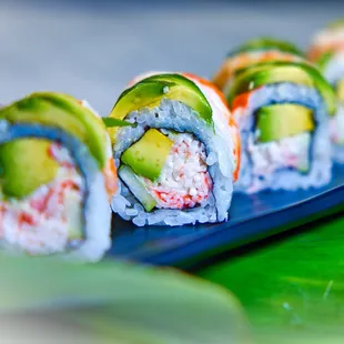 a close up of a plate of sushi