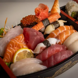 a variety of sushi in a tray