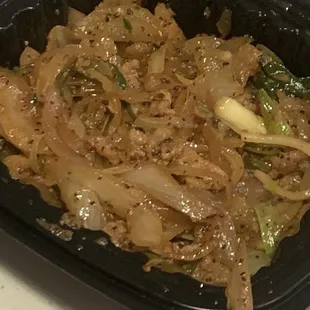 Mongolian pork. Too much black pepper. Not spicy. Full of onions.