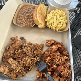 Two meat dinner. Chopped chicken, pulled pork. Apple pie baked beans, Green Chile Mac and cheese! All pretty delicious :)