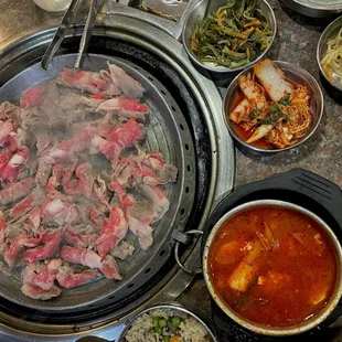 brisket, spicy tofu soup, fried rice, sides