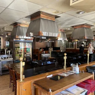a restaurant with a large kitchen