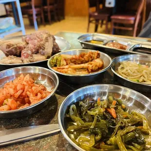 a variety of dishes of food