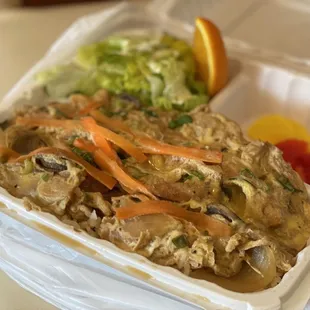 a meal in a styrofoam container