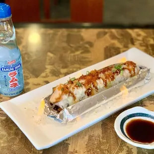 a plate of food and a bottle of water