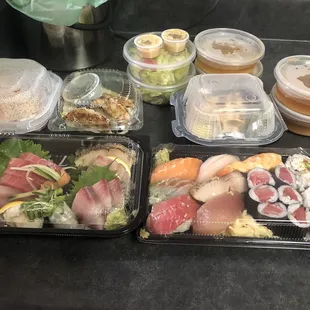 Sashimi dinner, sushi combo, (top L to R) shrimp croquettes, gyoza, and hamachi kama