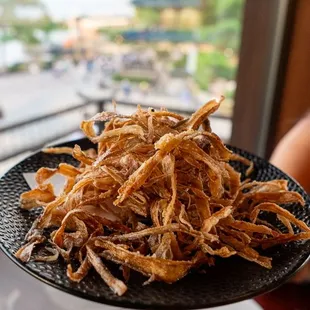 Gobo Chips (Vegan) Strips of crispy fried burdock root seasoned with salt and aonori